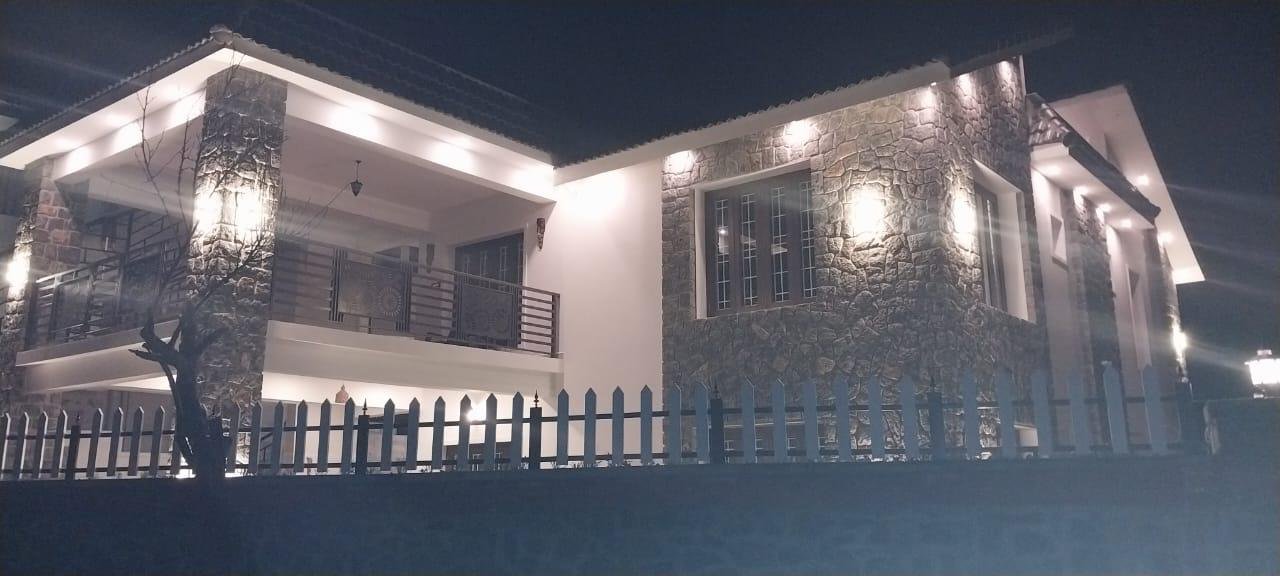 Entire 4-BHK Villa illuminated at night